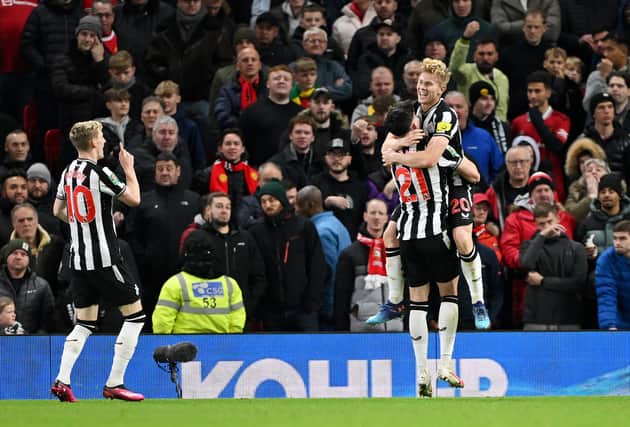 A wholesome moment between Tino Livramento and Lewis Hall as they celebrate the 19-year-old's first Newcastle United goal.