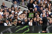 Referee, Simon Hooper watches the Video Assistant Referee before awarding a red card to Curtis Jones of Liverpool during the Premier League match between Tottenham Hotspur and Liverpool. (Photo by Justin Setterfield/Getty Images)