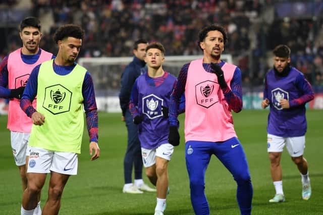 Paris Saint-Germain's French midfielder Warren Zaire-Emery (2nd-L) and Paris Saint-Germain's Brazilian defender Marquinhos. (Photo by GUILLAUME SOUVANT/AFP via Getty Images)