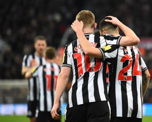 Newcastle United Anthony Gordon celebrates scoring the team's fourth goal with Miguel Almiron against Chelsea. (Photo by ANDY BUCHANAN / AFP) 