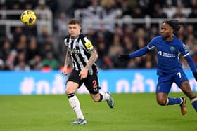 Kieran Trippier of Newcastle United in action watched by Raheem Sterling during the Premier League match between Newcastle United and Chelsea. (Photo by Stu Forster/Getty Images)