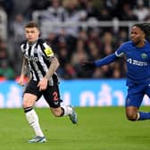 Kieran Trippier of Newcastle United in action watched by Raheem Sterling during the Premier League match between Newcastle United and Chelsea. (Photo by Stu Forster/Getty Images)