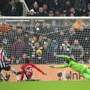 Anthony Gordon of Newcastle United scores the team's first goal during the Premier League match between Newcastle United and Manchester United at St. James Park on December 02, 2023 in Newcastle upon Tyne, England.