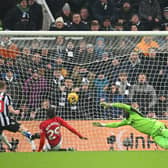 Anthony Gordon of Newcastle United scores the team's first goal during the Premier League match between Newcastle United and Manchester United at St. James Park on December 02, 2023 in Newcastle upon Tyne, England.