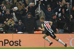 Newcastle United star Anthony Gordon scores against Manchester United. (Photo by ANDY BUCHANAN / AFP)