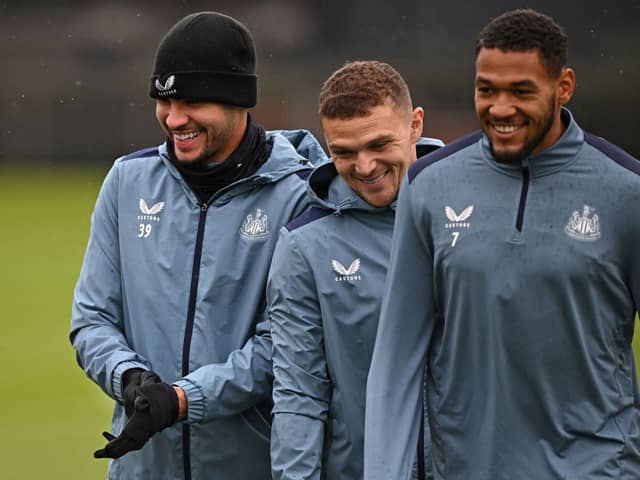 Newcastle United's Brazilian midfielder #39 Bruno Guimaraes (L), Newcastle United's English defender #02 Kieran Trippier (C) and Newcastle United's Brazilian striker #07 Joelinton attend a training session at the team's training facility in Newcastle-upon-Tyne, northeast England, on October 24, 2023 on the eve of their UEFA Champions League group F football match against Borussia Dortmund. (Photo by Oli SCARFF / AFP) (Photo by OLI SCARFF/AFP via Getty Images)