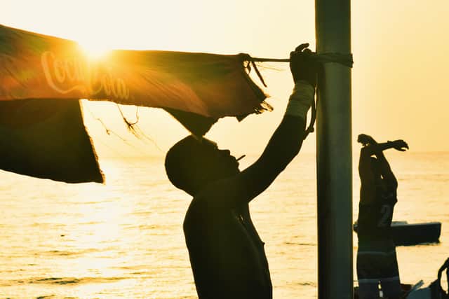 Fishermen at sunrise (Credit: Andrew White)