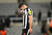 Fabian Schar of Newcastle United looks dejected after the team's defeat in the UEFA Champions League match between Newcastle United FC and AC Milan. (Photo by Stu Forster/Getty Images)
