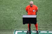 Polish referee Szymon Marciniak checks on a screen a potential penalty during the UEFA Champions League 1st round, day 5, Group F football match between Paris Saint-Germain (PSG) and Newcastle Unitec. (Photo by ALAIN JOCARD/AFP via Getty Images)