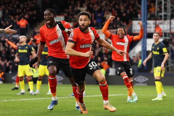 : Andros Townsend of Luton Town celebrates after scoring their team's first goal during the Premier League match between Luton Town and Newcastle United. (Photo by Richard Heathcote/Getty Images)