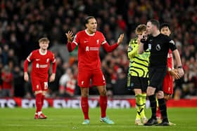 Virgil van Dijk of Liverpool reacts towards Match Referee Chris Kavanagh during the Premier League match between Liverpool and Arsenal. (Photo by Michael Regan/Getty Images)
