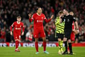 Virgil van Dijk of Liverpool reacts towards Match Referee Chris Kavanagh during the Premier League match between Liverpool and Arsenal. (Photo by Michael Regan/Getty Images)