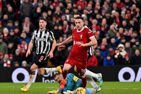 Diogo Jota hit the deck after skipping past Martin Dubravka