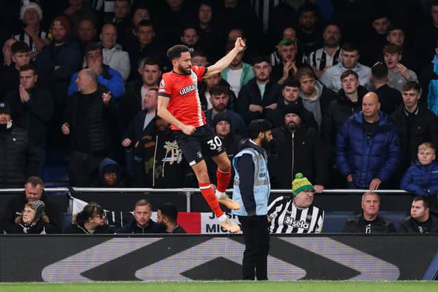 Andros Townsend of Luton Town celebrates after scoring their team's first goal against Newcastle United (Photo by Alex Pantling/Getty Images)