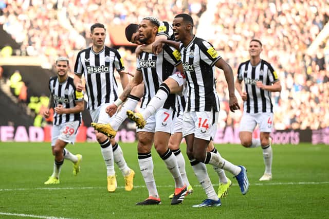 Joelinton of Newcastle United celebrates with teammates after scoring his team's first goal during the Emirates FA Cup Third Round match between Sunderland and Newcastle United at Stadium of Light on January 06, 2024 in Sunderland, England. 