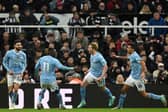 Manchester City's Belgian midfielder #17 Kevin De Bruyne (2R) celebrates after scoring their second goal against Newcastle United. (Photo by OLI SCARFF/AFP via Getty Images)