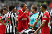 Liverpool defender Virgil van Dijk reacts to his red card against Newcastle United (Photo by Ian MacNicol/Getty Images)