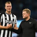 Newcastle United defender Dan Burn (left) and head coach Eddie Howe (right). (Photo by Stu Forster/Getty Images)