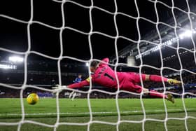 Martin Dubravka of Newcastle United fails to save a penalty taken by Cole Palmer of Chelsea during a penalty shoot out in the Carabao Cup Quarter Final match. (Photo by Julian Finney/Getty Images)