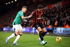 Kieran Trippier (left) jostling with Bournemouth's Marcus Tavernier during the 2-0 defeat in October