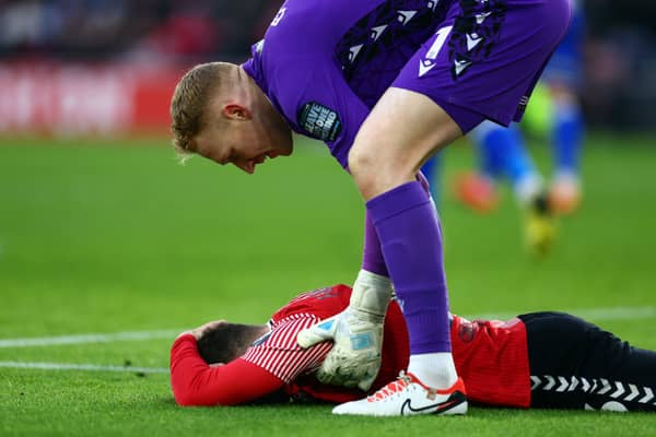 Sheffield Wednesday goal keeper Cameron Dawson attends to Ryan Fraser of Southampton. (Photo by Bryn Lennon/Getty Images)