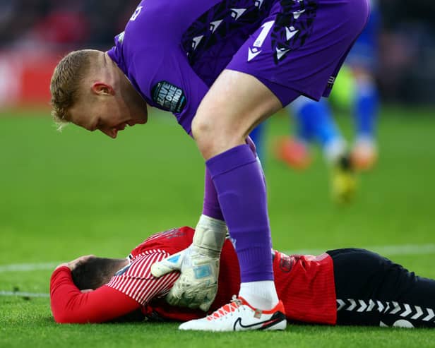 Sheffield Wednesday goal keeper Cameron Dawson attends to Ryan Fraser of Southampton. (Photo by Bryn Lennon/Getty Images)