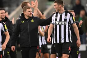 Newcastle United boss Eddie Howe and defender Sven Botman. (Photo by Stu Forster/Getty Images)