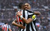 Newcastle United player Alexander Isak celebrates after scoring the first Newcastle goal with team mates Joe Willock during the Premier League match between Newcastle United and Wolverhampton Wanderers at St. James Park on March 02, 2024 in Newcastle upon Tyne, England. (Photo by Stu Forster/Getty Images)