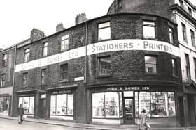 A view of no. 39 Low Friar Street Newcastle upon Tyne taken in 1978. The photograph shows no. 39 Low Friar Street which is on the corner of Fenkle Street and Low Friar Street. The building is the premises of 'John B. Bowes Ltd' with a shop on the ground floor and offices above.