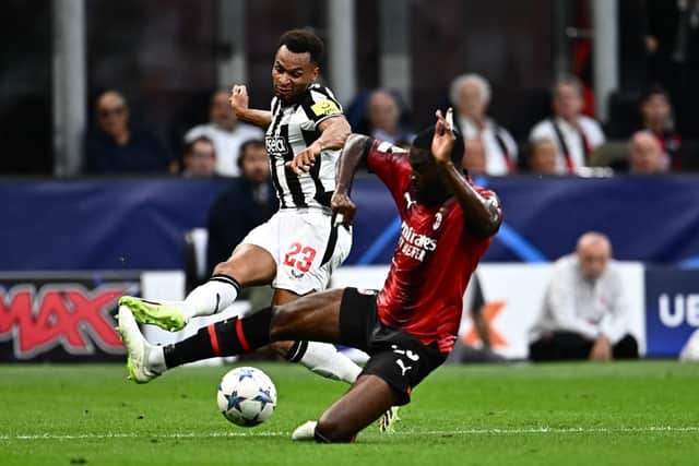 Newcastle United's English midfielder #23 Jacob Murphy fights for the ball with AC Milan's British defender #23 Fikayo Tomori during the UEFA Champions League 1st round group F football match between AC Milan and Newcastle at the San Siro stadium in Milan on September 19, 2023. (Photo by GABRIEL BOUYS / AFP) (Photo by GABRIEL BOUYS/AFP via Getty Images)