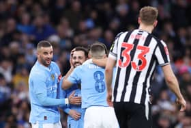 Bernardo Silva of Manchester City celebrates scoring his team's second goal with teammates during the Emirates FA Cup Quarter Final match between Manchester City and Newcastle United at Etihad Stadium on March 16, 2024 in Manchester, England. (Photo by Alex Livesey/Getty Images)