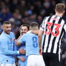 Bernardo Silva of Manchester City celebrates scoring his team's second goal with teammates during the Emirates FA Cup Quarter Final match between Manchester City and Newcastle United at Etihad Stadium on March 16, 2024 in Manchester, England. (Photo by Alex Livesey/Getty Images)