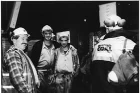 A group of miners sharing a joke at Wearmouth Colliery on the last week of production before closure- November 1993.