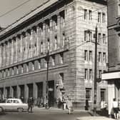A view of the exterior of Pilgrim Street Fire Station Newcastle upon Tyne taken in 1965. The entrance to Worswick Street is to the right of the fire station and Market Street and the corner of Carliol House are to the left.