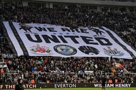 Fans of Newcastle United present a banner reading "We Are United" prior to the Premier League match between Newcastle United and Everton.. (Photo by Stu Forster/Getty Images) (Photo by Stu Forster/Getty Images)
