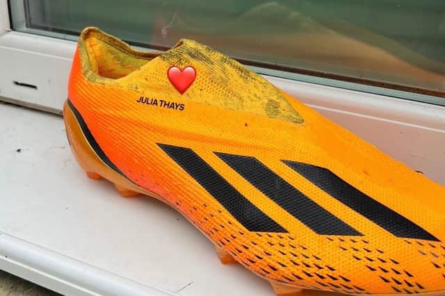 Joelinton's boots, shared by his partner Thays.