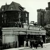 Doric House in front of the Castle Keep in 1966. The building opened in 1922 as a shop and was demolished in the 1970s. 