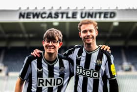 Newcastle United fans David Wilson and Ryan Gregson unveil Sela’s haptic shirts that will for the first time enable deaf fans to feel the atmosphere of the crowd inside St. James’ Park for Premier League game with Tottenham Hotspur on Saturday April 13. Sela will also donate its front-of-shirt logo placement and pitch side advertising rights to major deaf and hearing loss charity RNID for the game. Photo credit: Lucy Ray/PA Media