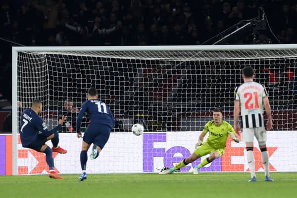  Kylian Mbappe of Paris Saint-Germain scores the team's first goal from a penalty kick during the UEFA Champions League match vs Newcastle United. (Photo by Justin Setterfield/Getty Images)