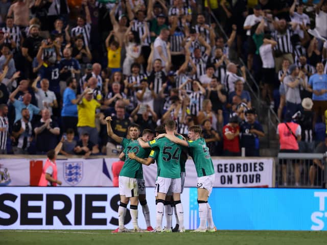 Elliot Anderson of Newcastle United celebrates with teammates after scoring their team's second goal  during the Premier League Summer Series match between Brighton & Hove Albion and Newcastle United at Red Bull Arena on July 28, 2023 in Harrison, New Jersey.