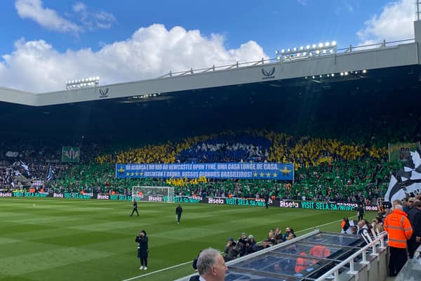 Newcastle United fans pay tribute to Bruno Guimaraes and Joelinton. 