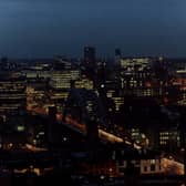 A bird's eye view of Newcastle upon Tyne at night taken in 1990. The photograph has been taken from a tall building in Gateshead looking across towards the Tyne Bridge and Newcastle upon Tyne.