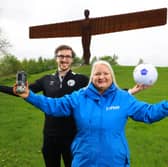 Jack McGraghan from Gateshead FC, with Gillian Morton, head of customer experience at Lumo, holding the commemorative cans.
