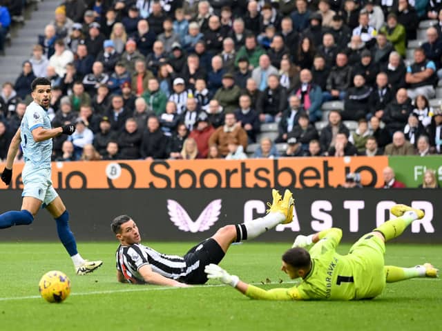 Dominic Solanke goes for goal against Newcastle, but his shot is saved by Martin Dubravka