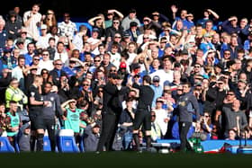 Vincent Kompany, Manager of Burnley, is shown a red card by Referee Darren England during the Premier League match with Chelsea FC. (Photo by Richard Pelham/Getty Images)