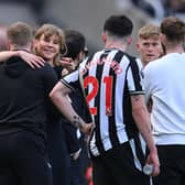 Newcastle United co-owner Amanda Staveley shares a hug with Eddie Howe. (Photo by Stu Forster/Getty Images)