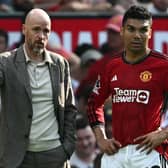 Erik ten Hag talks with Casemiro during Manchester United’s defeat to Arsenal at the weekend.