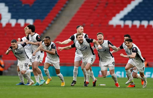 Gateshead celebrate victory in the Isuzu FA Trophy Final at Wembley Stadium