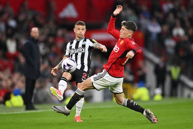 Kieran Trippier of Newcastle United passes the ball from Alejandro Garnacho of Manchester United during the Premier League match between Manchester United and Newcastle United at Old Trafford on May 15, 2024 in Manchester, England. (Photo by Stu Forster/Getty Images)