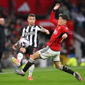 Kieran Trippier of Newcastle United passes the ball from Alejandro Garnacho of Manchester United during the Premier League match between Manchester United and Newcastle United at Old Trafford on May 15, 2024 in Manchester, England. (Photo by Stu Forster/Getty Images)